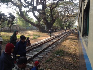 Repairing the locomotive. ie. Hit it with a rock.